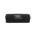 Parlante portátil JBL Flip 7 negro con textura tejida, correa lateral y botones en vista trasera