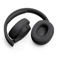 Audífonos JBL negros de diadema con almohadillas acolchadas en vista superior diagonal
