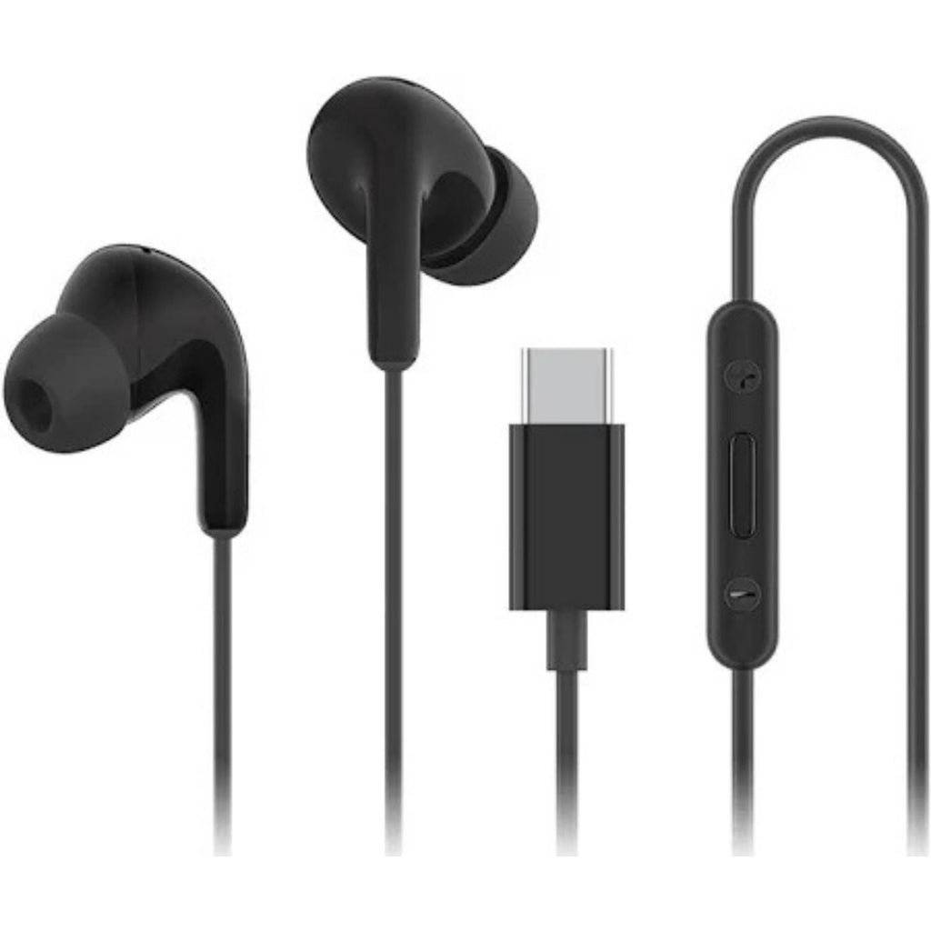 Auricular con cable negro colocado en oído de maniquí en vista lateral